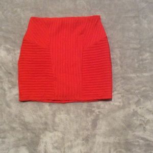Red mini skirt with zipper, size M by NASTY GAL